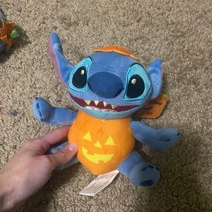 Disney Stitch smiling pumpkin plush